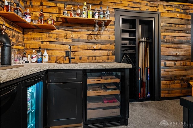 1950 Stone Creek Blvd, Clearcreek Twp, OH 45458 - indoor wet bar featuring wine cooler and carpet
