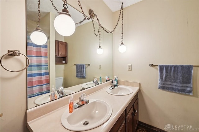4595 Comanchee Trl, Silver Creek Twp, OH 45335 - full bathroom featuring double vanity and curtained shower