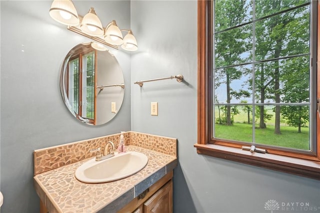 4595 Comanchee Trl, Silver Creek Twp, OH 45335 - bathroom with vanity, plenty of natural light, and a chandelier