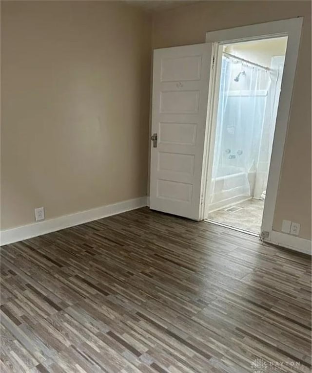 4009 E 3rd St, Dayton, OH 45403 - spare room featuring wood finished floors