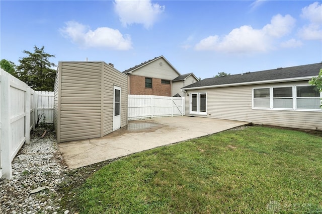 51 Jill Dr, Germantown, OH 45327 - rear view of property featuring a patio, a fenced backyard, and a storage shed