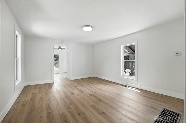 804 S Walnut St, Troy, OH 45373 - empty room featuring wood finished floors and baseboards