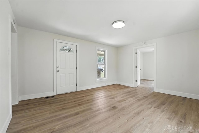 804 S Walnut St, Troy, OH 45373 - spare room featuring light wood finished floors