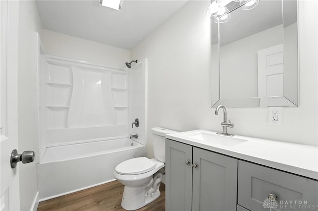 804 S Walnut St, Troy, OH 45373 - full bath with vanity, wood finished floors, and shower / bath combination