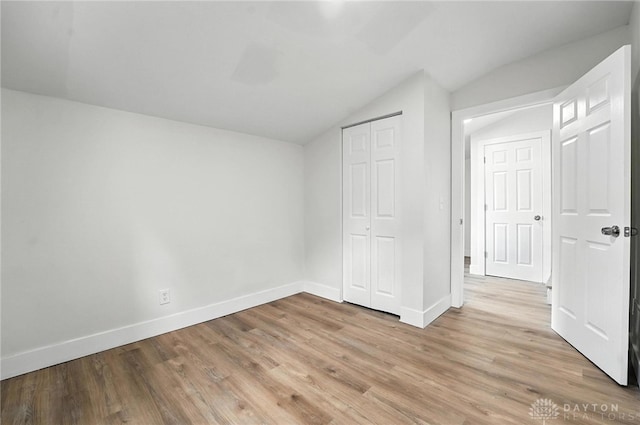 804 S Walnut St, Troy, OH 45373 - additional living space with lofted ceiling and light wood-type flooring
