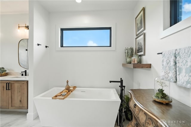 1241 Normandy Rue, Centerville, OH 45458 - full bath with a freestanding tub, vanity, and marble finish floors