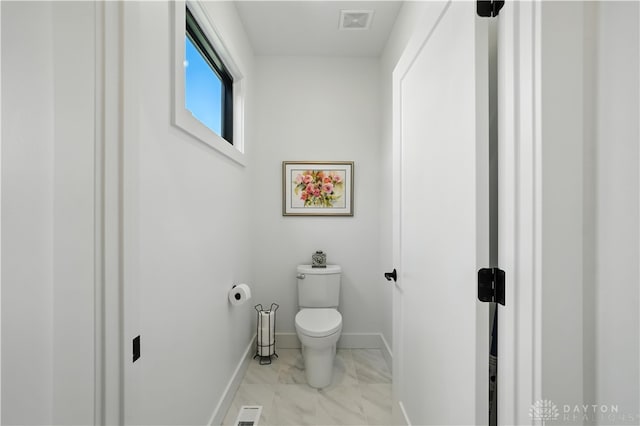 1241 Normandy Rue, Centerville, OH 45458 - bathroom featuring baseboards and marble look tiles