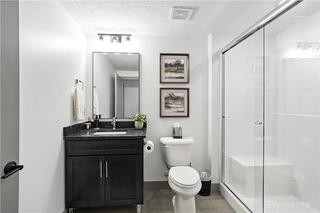 1241 Normandy Rue, Centerville, OH 45458 - bathroom featuring vanity, a stall shower, and a textured ceiling
