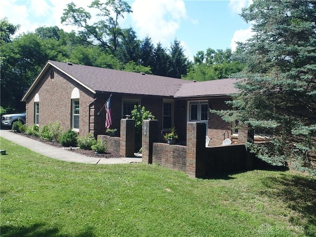 12071 Oxford Rd, Germantown, OH 45327 - ranch-style house with brick siding and a front lawn
