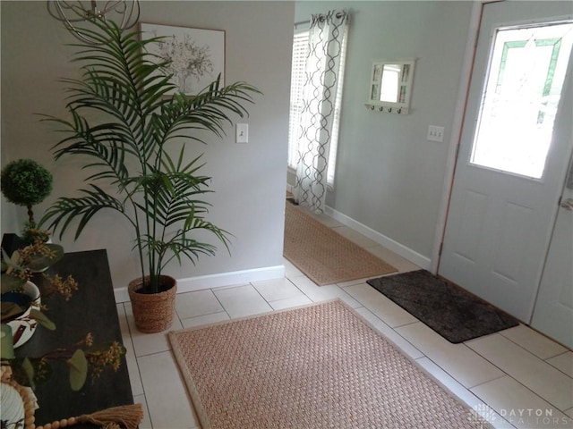 12071 Oxford Rd, Germantown, OH 45327 - foyer entrance featuring light tile patterned flooring and baseboards