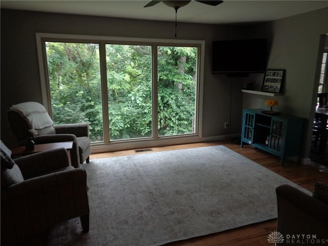 12071 Oxford Rd, Germantown, OH 45327 - living area with a ceiling fan, healthy amount of natural light, and wood finished floors