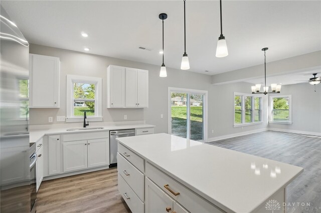 3384 Randall Dr, Cedarville Twp, OH 45314 - kitchen with stainless steel appliances, light wood-style flooring, open floor plan, light countertops, and recessed lighting