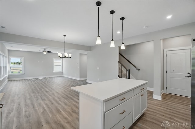 3384 Randall Dr, Cedarville Twp, OH 45314 - kitchen featuring ceiling fan, light wood-style floors, light countertops, recessed lighting, and hanging light fixtures