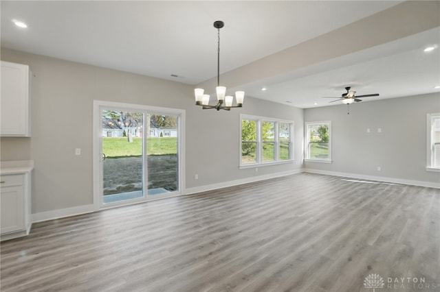 3384 Randall Dr, Cedarville Twp, OH 45314 - unfurnished dining area featuring recessed lighting, light wood finished floors, a chandelier, and a ceiling fan