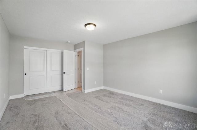 3384 Randall Dr, Cedarville Twp, OH 45314 - unfurnished bedroom featuring light carpet and a closet
