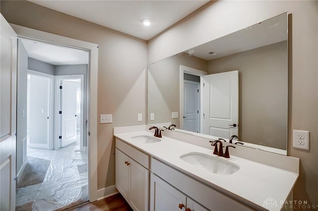 3384 Randall Dr, Cedarville Twp, OH 45314 - bathroom featuring double vanity and baseboards
