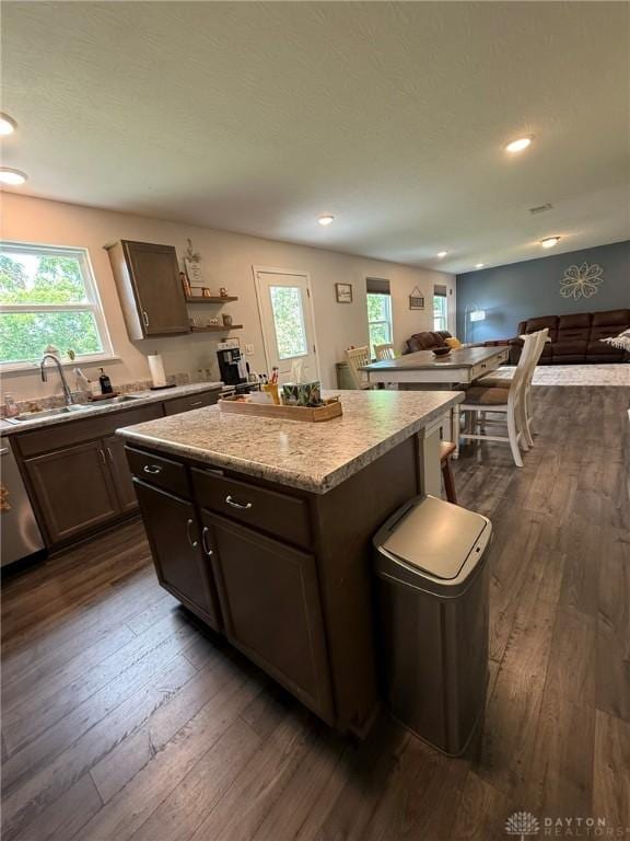 562 Maxwell Ct, Germantown, OH 45327 - kitchen featuring a kitchen island, dark wood-type flooring, open floor plan, open shelves, and dishwasher