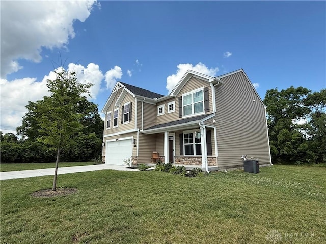 562 Maxwell Ct, Germantown, OH 45327 - view of front of house featuring driveway, a garage, and a front lawn