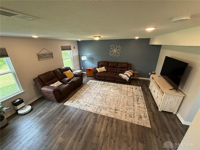 562 Maxwell Ct, Germantown, OH 45327 - living area featuring dark wood finished floors and a textured ceiling