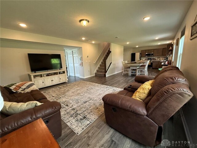 562 Maxwell Ct, Germantown, OH 45327 - living area with stairs, dark wood finished floors, and recessed lighting