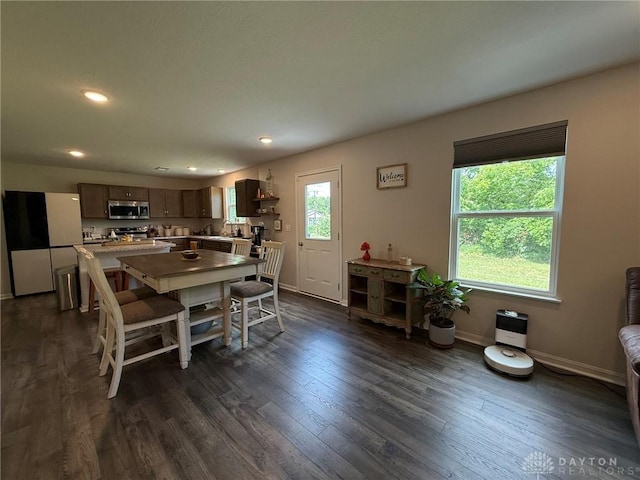 562 Maxwell Ct, Germantown, OH 45327 - dining space with dark wood finished floors and recessed lighting