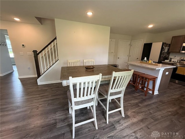 562 Maxwell Ct, Germantown, OH 45327 - dining space with stairway, dark wood-type flooring, and recessed lighting
