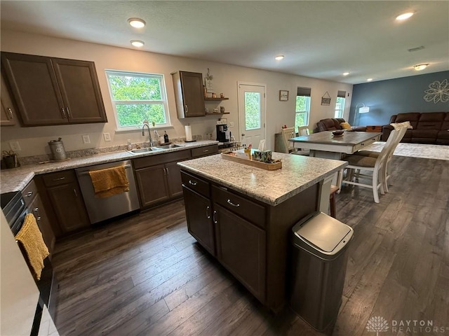 562 Maxwell Ct, Germantown, OH 45327 - kitchen with stainless steel dishwasher, open floor plan, plenty of natural light, dark wood finished floors, and recessed lighting