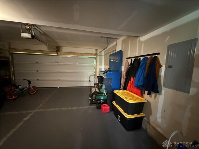562 Maxwell Ct, Germantown, OH 45327 - garage with electric panel and a garage door opener