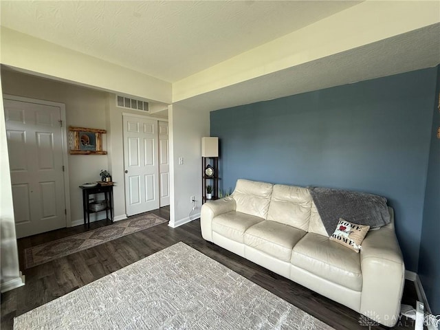 562 Maxwell Ct, Germantown, OH 45327 - living area featuring wood finished floors and a textured ceiling