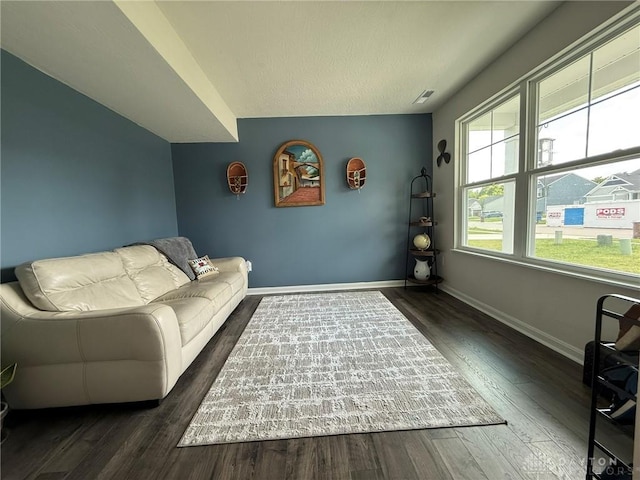 562 Maxwell Ct, Germantown, OH 45327 - living room featuring baseboards and dark wood-style flooring