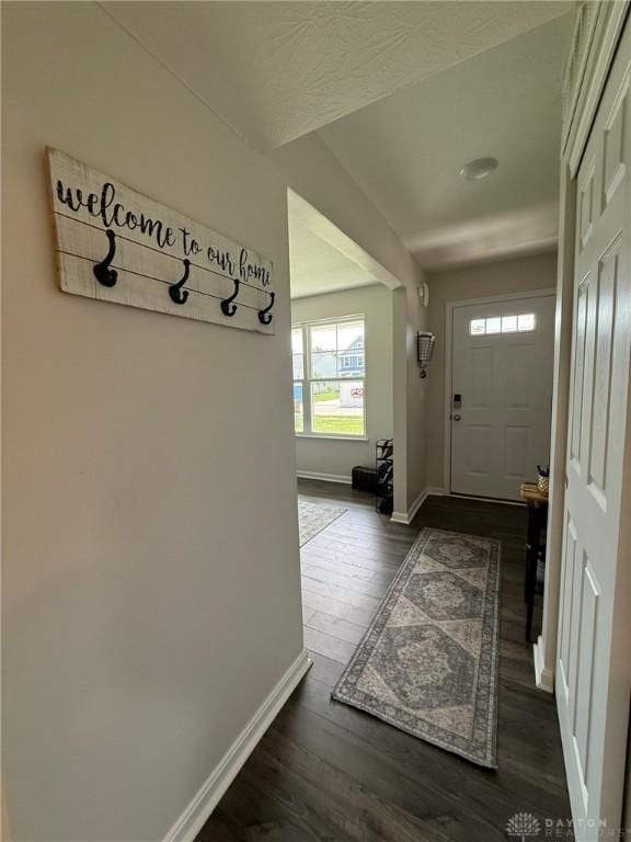 562 Maxwell Ct, Germantown, OH 45327 - entrance foyer with baseboards and dark wood-style flooring