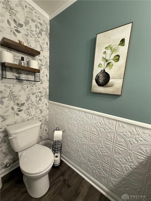 562 Maxwell Ct, Germantown, OH 45327 - bathroom featuring wood finished floors, crown molding, wallpapered walls, and a wainscoted wall