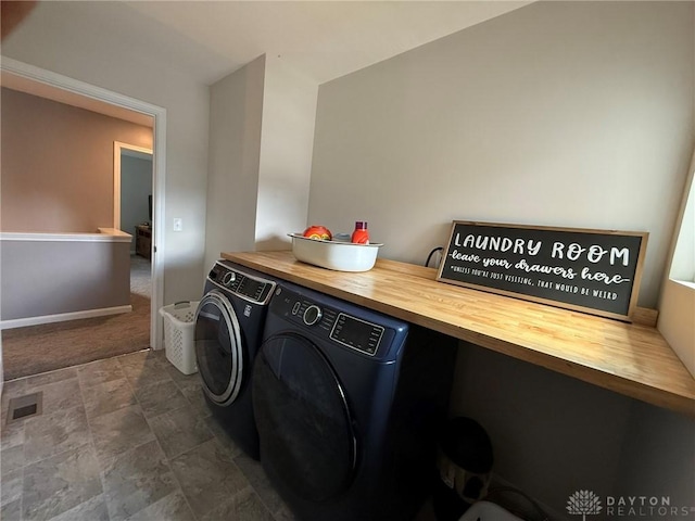 562 Maxwell Ct, Germantown, OH 45327 - laundry room featuring separate washer and dryer, a desk, and stone finish flooring