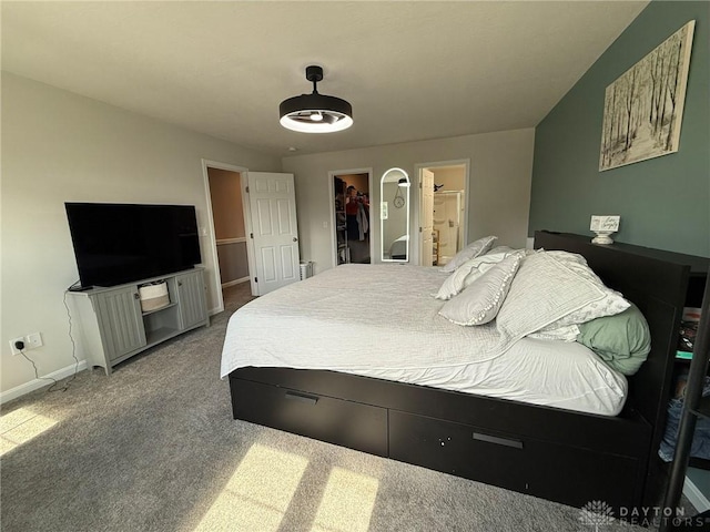 562 Maxwell Ct, Germantown, OH 45327 - carpeted bedroom featuring a walk in closet, a closet, and ensuite bathroom