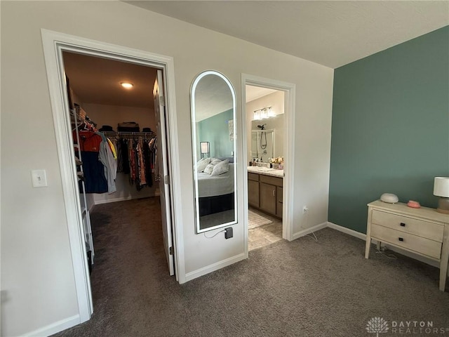 562 Maxwell Ct, Germantown, OH 45327 - bedroom with a spacious closet, carpet floors, a closet, and ensuite bathroom