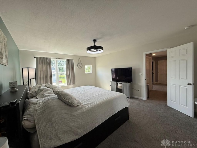 562 Maxwell Ct, Germantown, OH 45327 - bedroom featuring carpet flooring and a textured ceiling