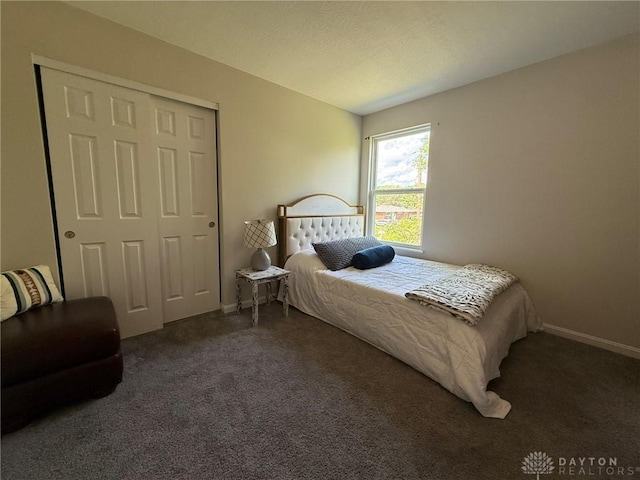 562 Maxwell Ct, Germantown, OH 45327 - carpeted bedroom featuring a closet and baseboards