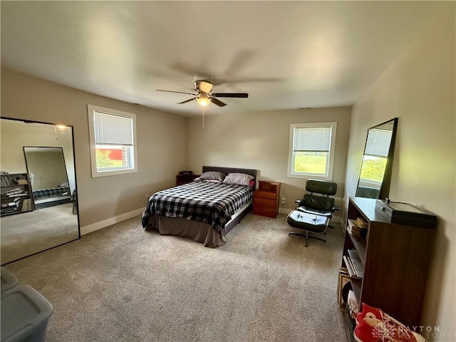 10995 Rockridge Rd, Lewisburg, OH 45338 - carpeted bedroom with baseboards and ceiling fan
