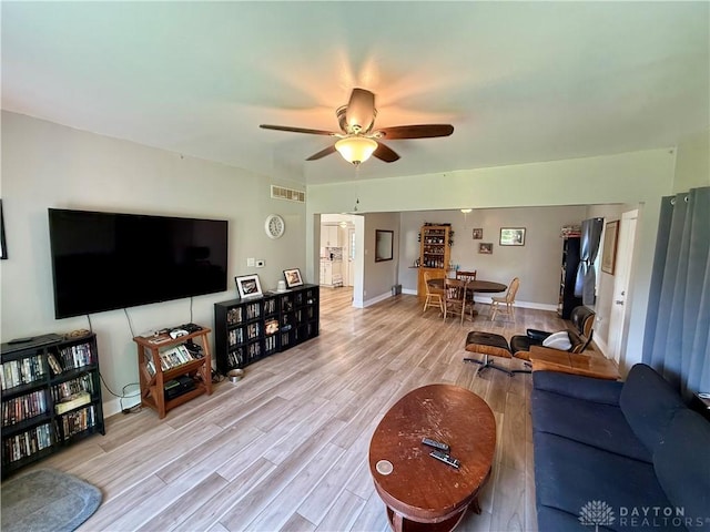 10995 Rockridge Rd, Lewisburg, OH 45338 - living area featuring ceiling fan and wood finished floors