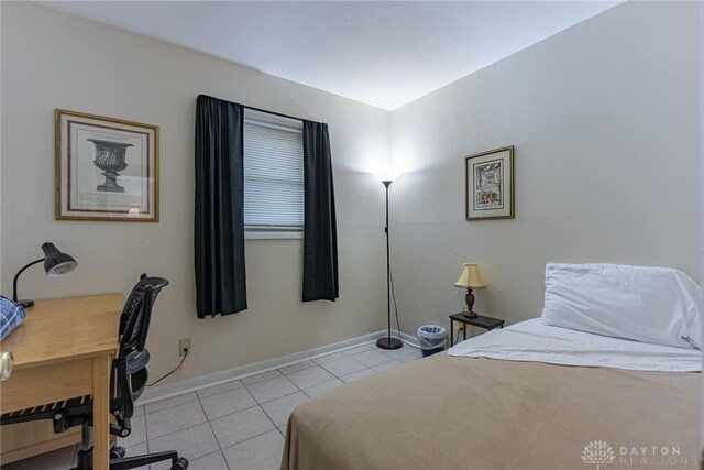 2701 Mini Ct, Dayton, OH 45420 - bedroom featuring light tile patterned floors and a desk