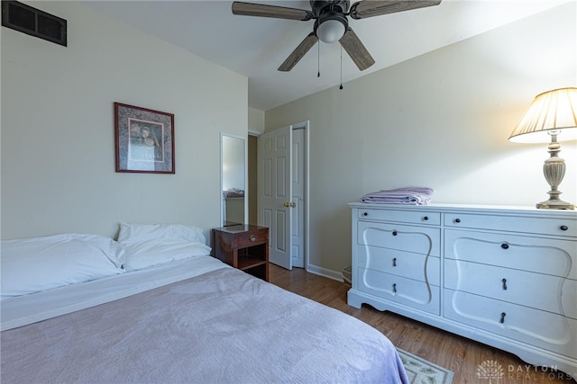 2701 Mini Ct, Dayton, OH 45420 - bedroom with dark wood-style flooring and a ceiling fan
