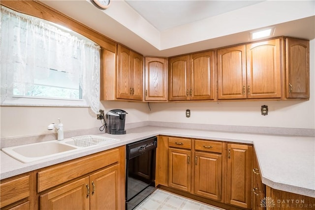4267 W Wenger Rd, Clayton, OH 45315 - kitchen with black dishwasher, light countertops, and brown cabinets