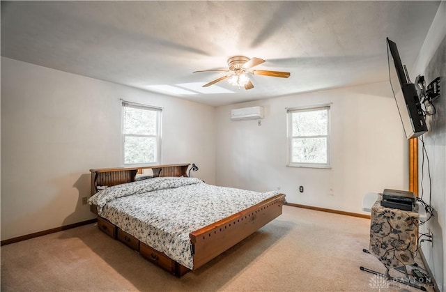 4267 W Wenger Rd, Clayton, OH 45315 - bedroom featuring a wall mounted air conditioner, multiple windows, and light colored carpet
