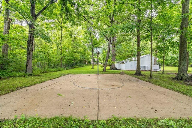 4267 W Wenger Rd, Clayton, OH 45315 - view of sport court featuring a lawn and basketball court