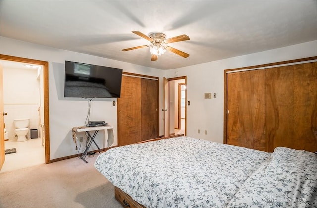 4267 W Wenger Rd, Clayton, OH 45315 - bedroom featuring two closets, light colored carpet, and ceiling fan