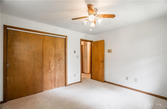 4267 W Wenger Rd, Clayton, OH 45315 - unfurnished bedroom featuring carpet flooring, a closet, and ceiling fan