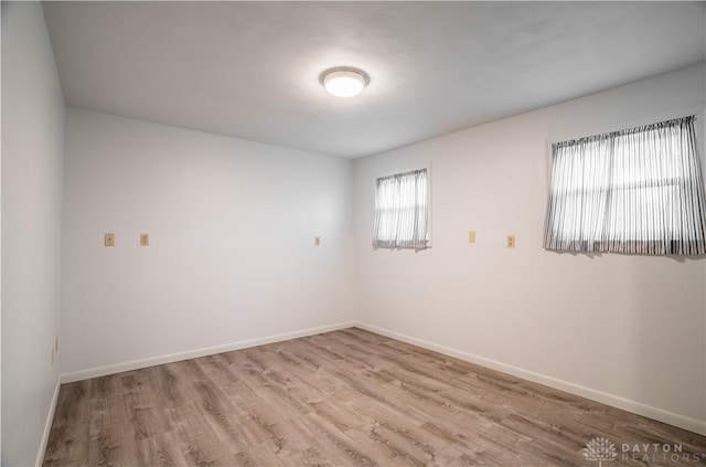 4267 W Wenger Rd, Clayton, OH 45315 - empty room with light wood-type flooring