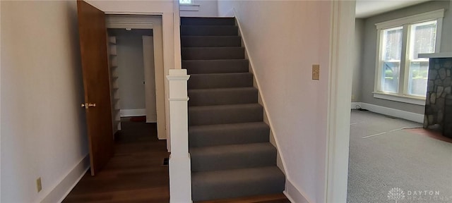 289 Dayton Ave, Xenia, OH 45385 - staircase featuring baseboards
