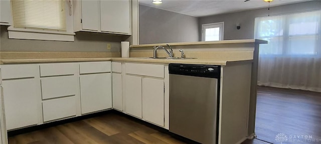 289 Dayton Ave, Xenia, OH 45385 - kitchen featuring dishwasher, dark wood finished floors, light countertops, white cabinets, and a peninsula