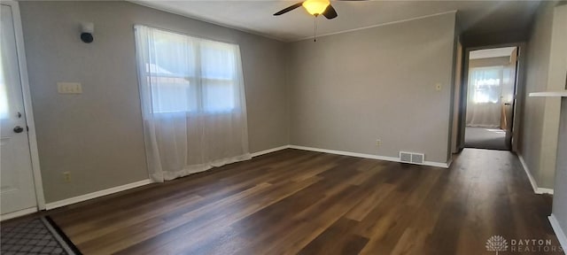 289 Dayton Ave, Xenia, OH 45385 - spare room with ceiling fan and dark wood-style flooring